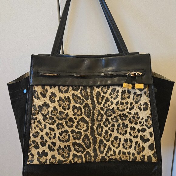 Furla Handbags - Vintage Furla Black Leather Trapeze Bag with Tiger Print & Gold Lining